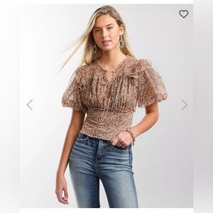 Super cute Free People Beatrice Lace up top. NWT